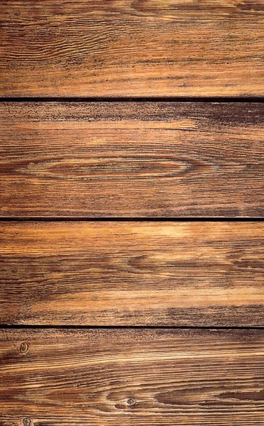 Dikey kahverengi arka plan. Ahşap doku. Tahta tahtalar.