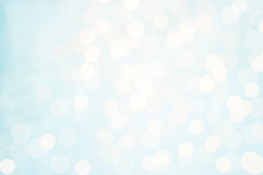 Spring blurred background. Defocused lights on a blue background, can be used as an overlay effect