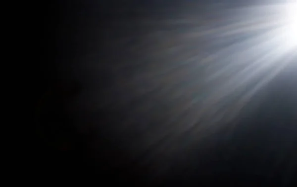 Flash or Star Light Rays over Black Background. Also can be used as an Overlay with a Blending Mode (screen).