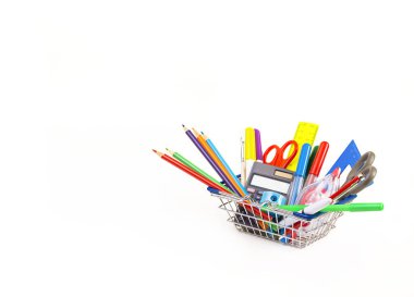 shopping cart with stationery on a white background