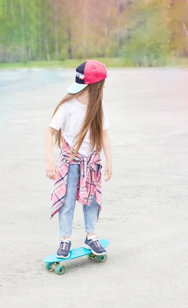 Little Smiling Girl Stands Outdoors Skateboard Her Hands Background Forest — Stock Photo, Image