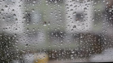 raindrops on glass video. closeup