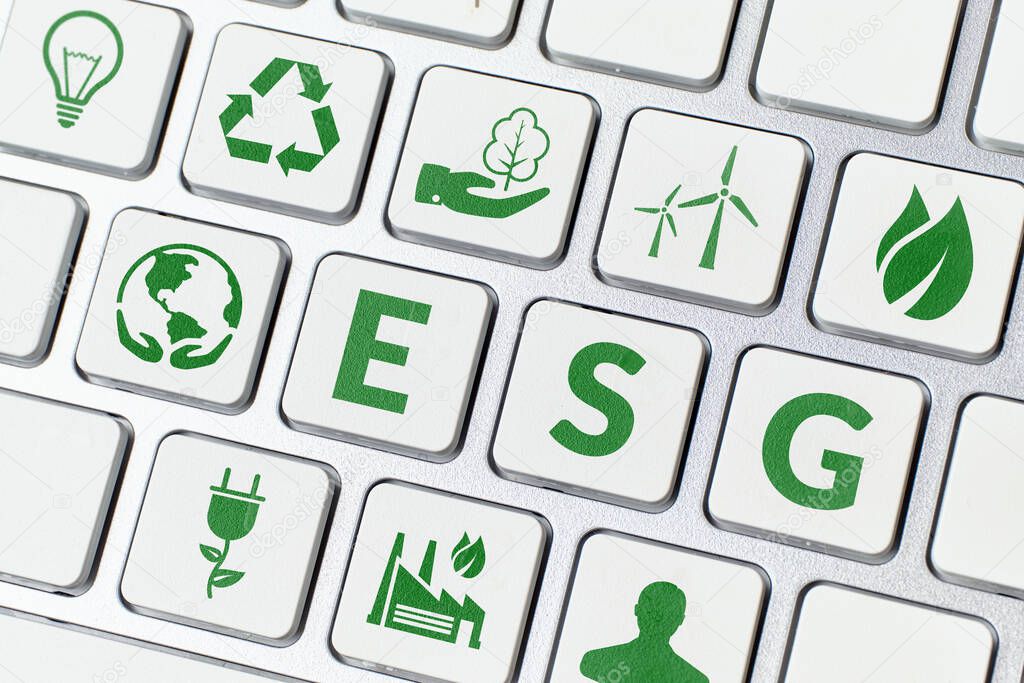 ESG or environmental social governance. Managing a company with a nature conservation strategy. Icons on the keyboard