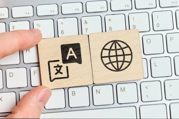 Hand Holding Piece Wood Symbol Translator Keyboard — Stock Photo, Image