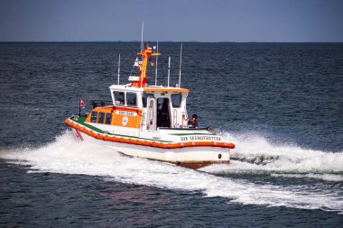 German boat of the sea rescue on an emergency trip. High quality photo