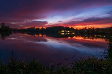 Fantastic sunset on the lake, Kiessee Goettingenin Germany. High quality photo