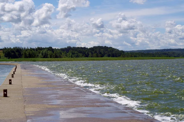 Concrete pier, barrier-free promenade entering the sea