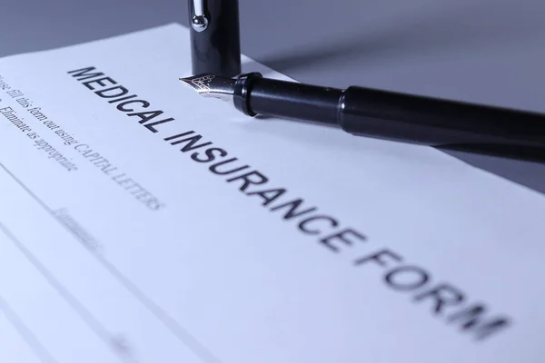 Medical Insurance Form Pen Lain Page Stock Image