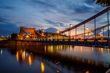 evening view of the grunwald bridge in wroclaw in poland