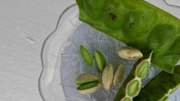 Top View Bitter Bean Pieces Green Seeds Have Been Peeled — Stock Video