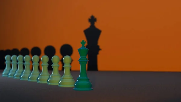 Several Green Chess Pawns Lined Chess King Forefront Concept Leadership — Zdjęcie stockowe