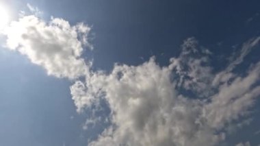 Time lapse of clouds in a blue sky on a sunny morning in a tropical climate, climate change concept