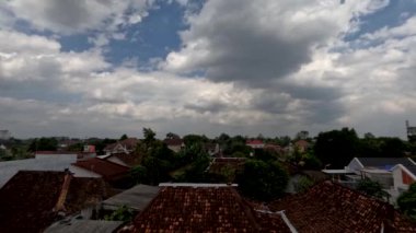 Time lapse of cloud movement over residential areas in rural areas, climate change concept