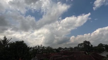 Time lapse of cloud movement over residential areas in rural areas, climate change concept