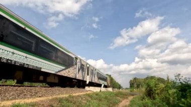 Yogyakarta, Indonesia - August 25, 2022. Airport train that connects Yogyakarta City with New Yogyakarta International Airport (NYIA), divides villages and rice fields that have good views