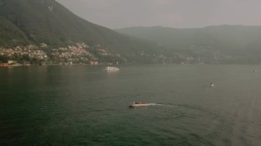 boat sailing off the coast view from above