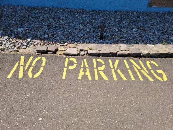 Parking Sign Done Using Stencil Yellow Paint Blacktop — Zdjęcie stockowe