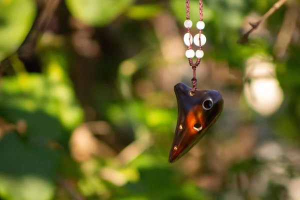 A small soprano brown ocarina