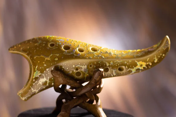 Ocarina being displayed on stand
