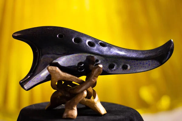 Ocarina being displayed on stand