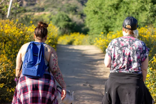 Two woman walking in nature