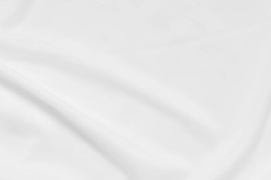 Beyaz kumaş arka planının soyut ve yumuşak odak dalgası, beyaz doku ve detay