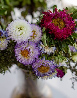 Old bouquet. Close-up of withered flowers. The concept of life and death. Withered flower background