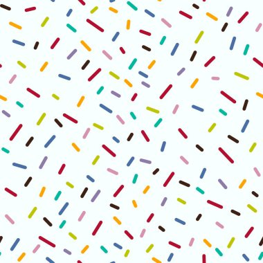 Çocuklar kumaşlar, ambalajlar, hediyeler, çarşaflar ve ambalaj kağıtları için şekersiz şeker serpintileri serpiştiriyor. 