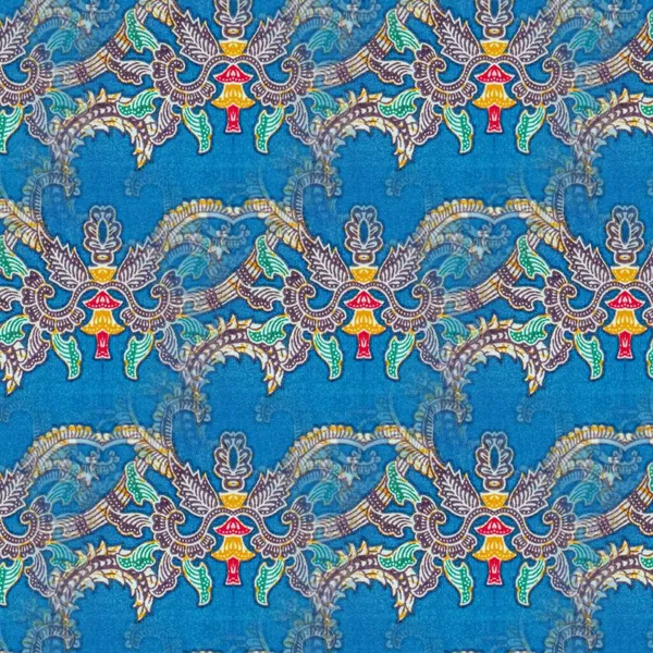 Abstract symmetrical pattern of blue Indonesian batik, batik pattern blur, Image with mirror effect, blur Kaleidoscope abstract pattern.