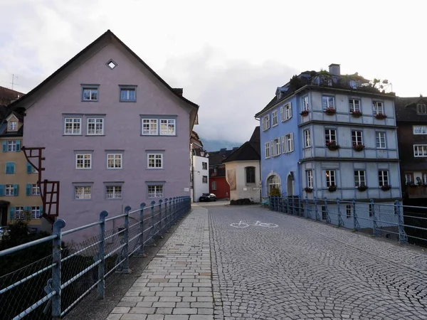 Colorful houses in medieval town Feldkirch, Vorarlberg, Austria at the riverbank of Ill. — Stock Photo, Image