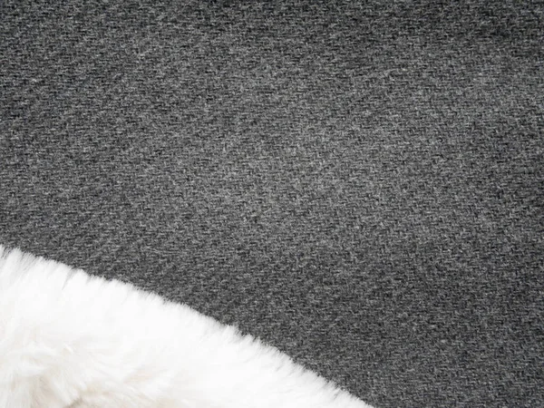 Textura de tecido cinza com pele branca, close-up de estrutura de lã de ovelha, fundo papel de parede. — Fotografia de Stock