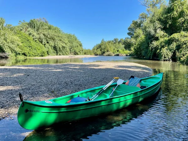 Pack canoe on calm river Tavignano with beautiful green nature. Corsica, France. — Stockfoto