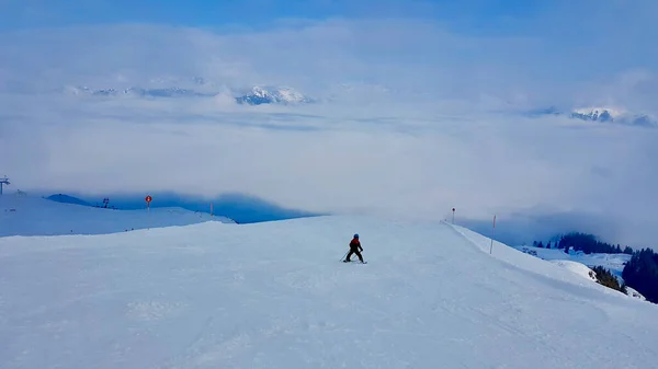 Child skiing on empty slopes in Montafon, Vorarlberg, Austria. — Stockfoto