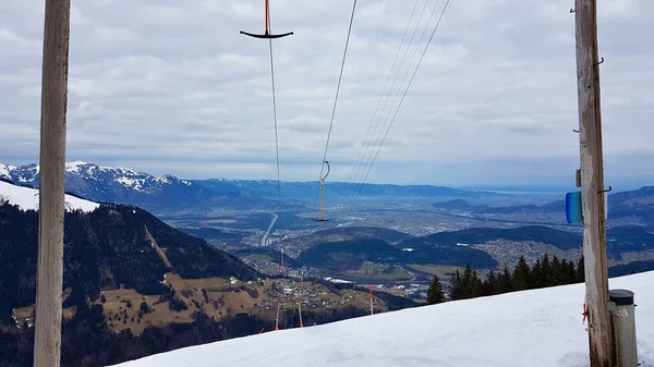 Vintage ski lift Bazora with the Rhine valley in the background. Vorarlberg, Austria. — Stockfoto