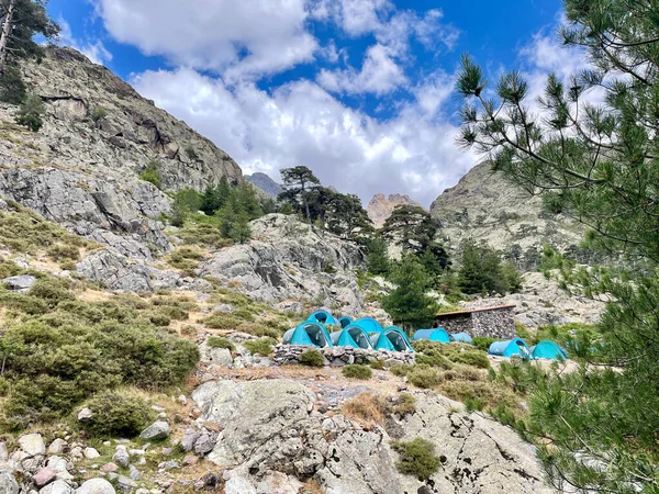 Bergerie de Ballone, Corsica, 29.07.2021. Blue Biwak tents at Bergerie de Ballone, along the Gr20 trail. — Fotografia de Stock