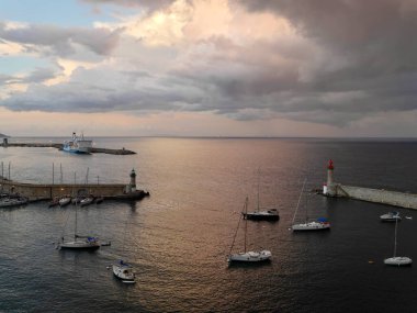  Bastia, Corsica, 17.07.2020. Old harbor of Bastia seen from the citadel at sunset. Corsica, France.