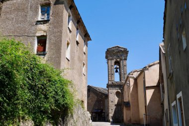 Traditional stone houses and bell tower in Stazzona, a dreamy mountain village nestled in the mountains of Castagniccia. Corsica, France.