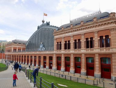 Madrid, Spain, 12.04.2022. Exterior view of old Atocha train station, known for its botanical garden. High quality photo