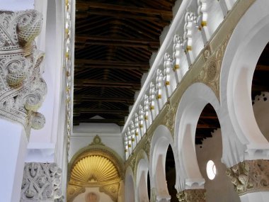 Toledo, Spain, 13.04.2022. Mudejar arches inside Santa Maria la Blanca Synagogue in the Jewish quarter. High quality photo clipart