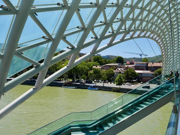 Bridge of Peace, a pedestrian bridge over the Kura river in Tbilisi, Georgia. High quality photo