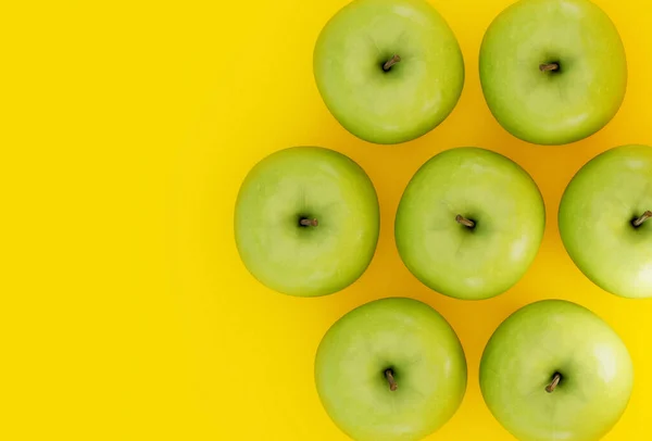 Green Apples Yellow Background Delicious Fruits Top View — Stockfoto