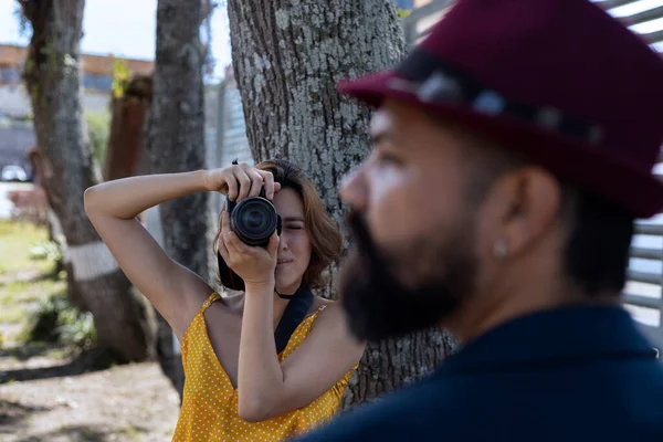Young Latin American Woman Camera Hand Takes Pictures Her Partner — Stok fotoğraf