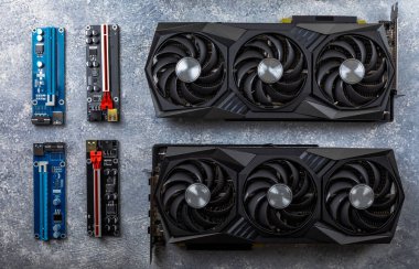 Oyun kartı, video oyunları ve kripto para madenciliği için somut bir arkaplan üzerine bir video kartı adaptörü. Bilgisayar parçaları. GPU kartı. Boşluğu kopyala