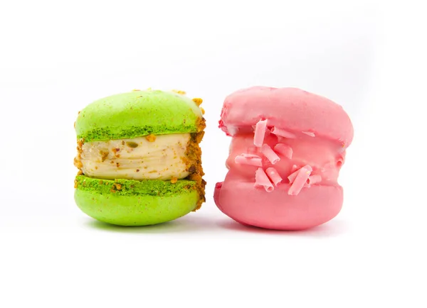 French macaroons on a white background.  French dessert. Sweet table. Copy space. Place for text.
