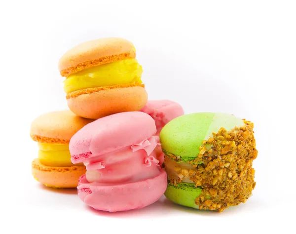 French macaroons on a white background.  French dessert. Sweet table. Copy space. Place for text.