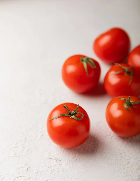 Fresh Red Tomatoes Gray Texture Background Cherry Tomatoes Green Stems — Stockfoto