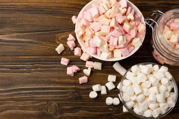 Many Different Marshmallows Bowls Jars Brown Textured Wood White Fruit — Stock Photo, Image