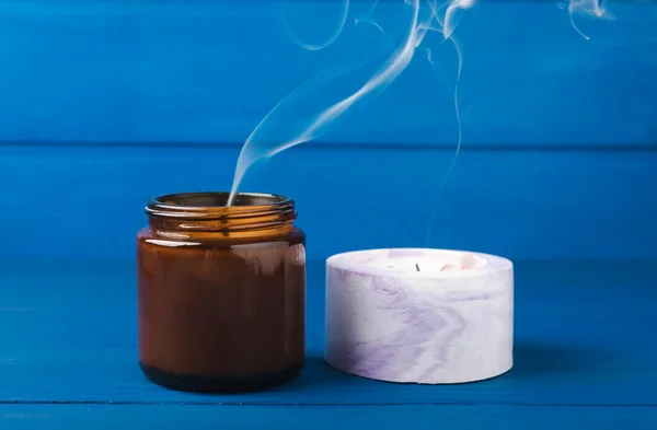 Smoldering Candle Wick Smoke Blue Wood Texture Winter Home Decor — ストック写真