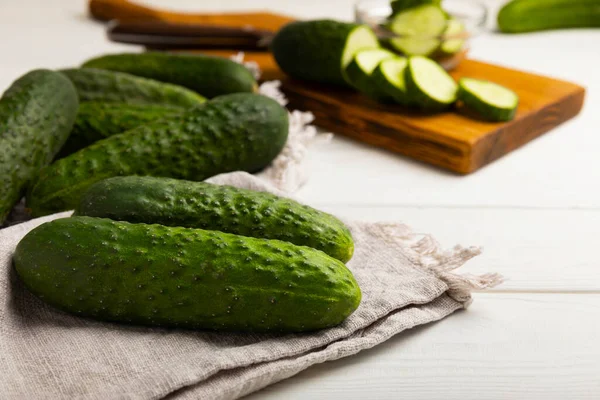 Fresh Organic Cucumbers White Wooden Table Cucumber Slices Salad Ingredient — Fotografia de Stock