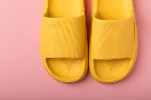 Stylish Rubber Yellow Slippers Pink Background Changeable Shoes Beach Shoes — 스톡 사진